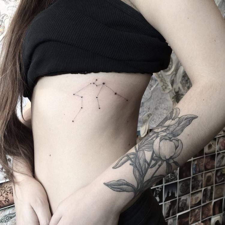 Aquarius Constellation Tattoo On The Left Rib