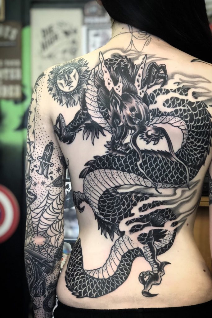 Big ole black dragon for millie tattoo
