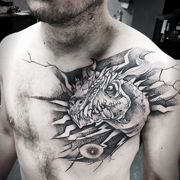 Black dragon on left men chest
