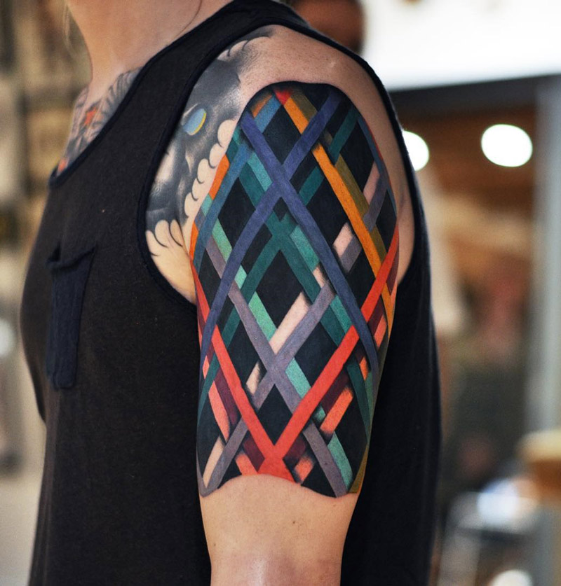 Colored lines abstract on gus arm tattoo