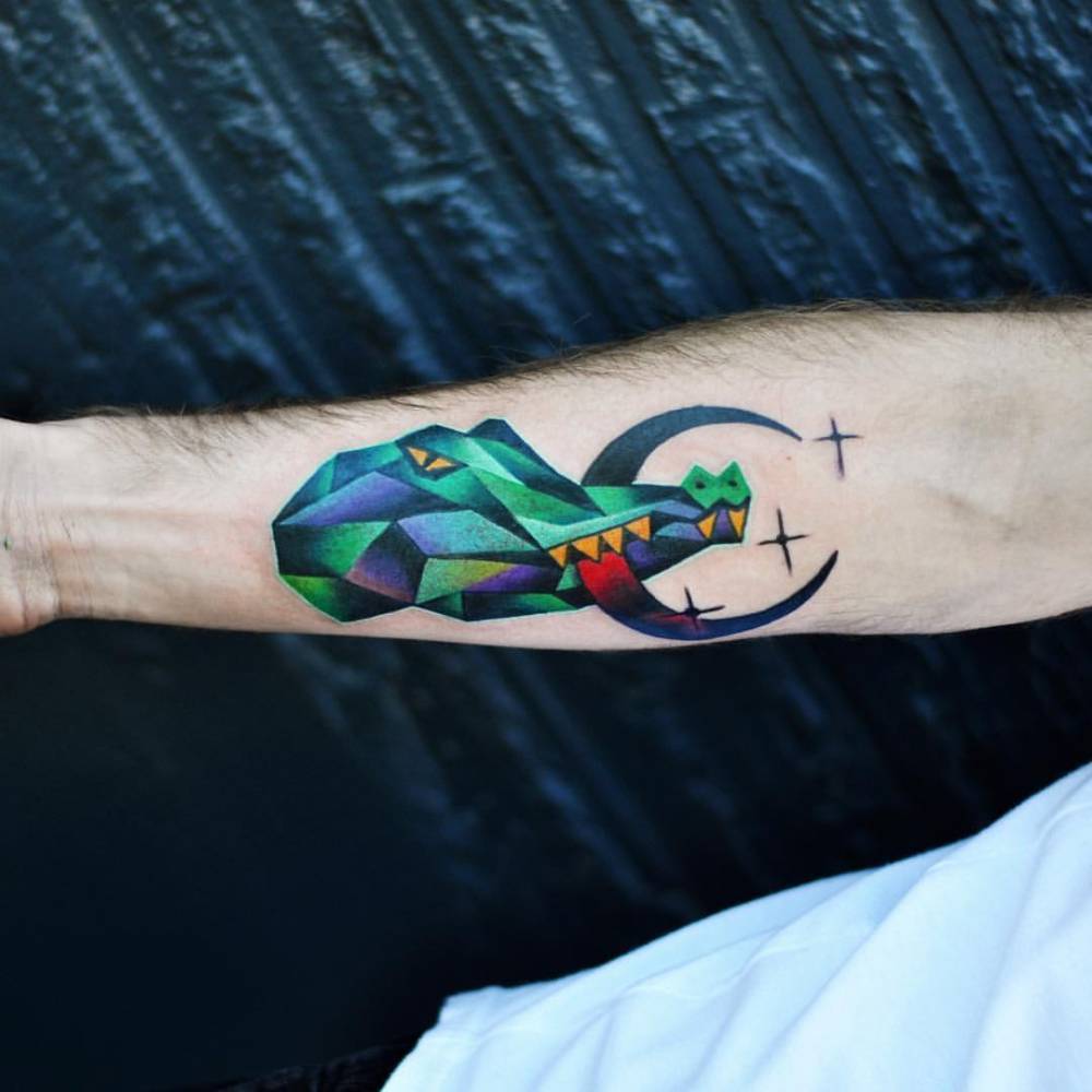 Crocodile with a crescent moon animal tattoo