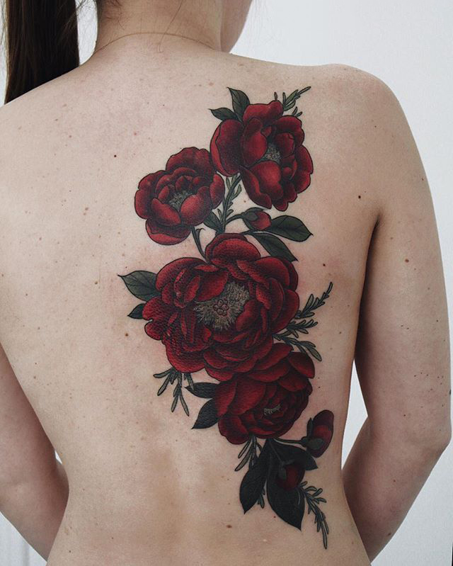 Dark back rose tattoo