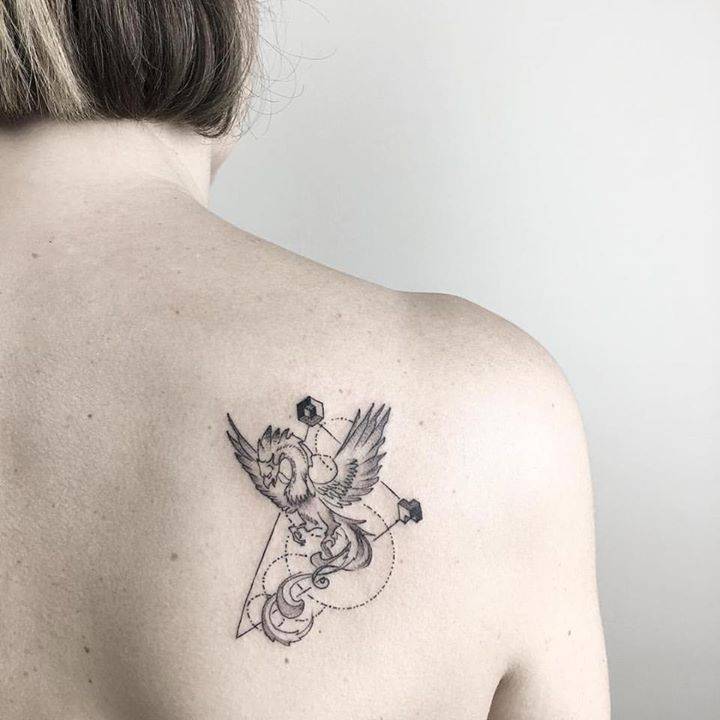Girl back dragon tattoo