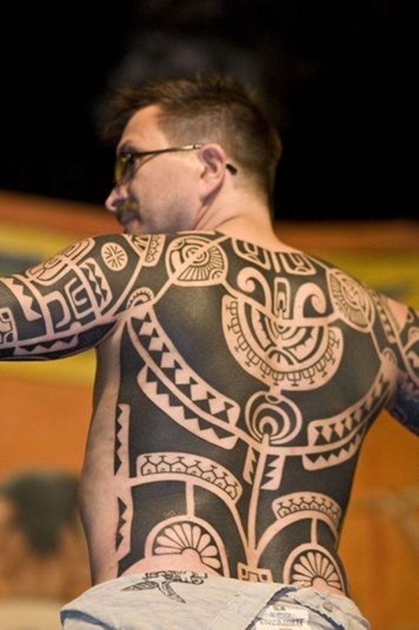 Large tribal tattoo on the back