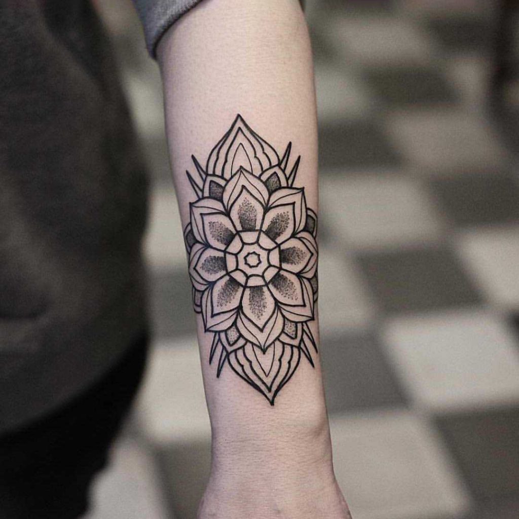 Mandala on the left forearm