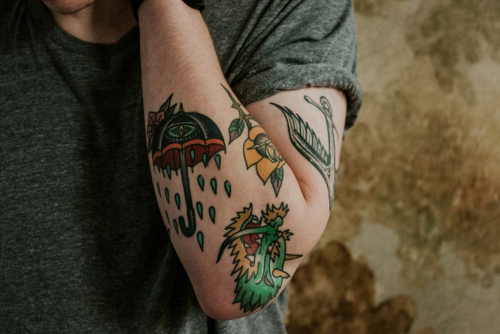 Men left half arm Abstract tattoo