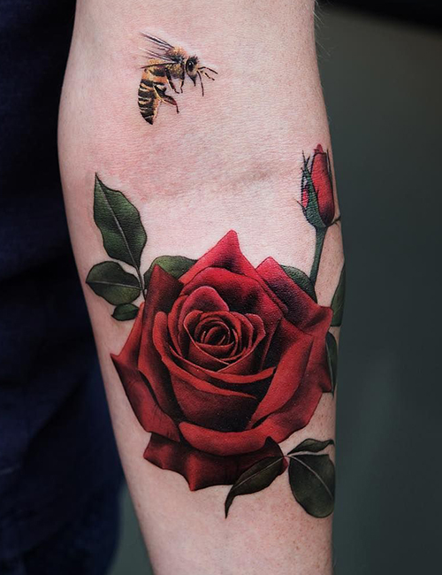 Red rose tattoos on Arm