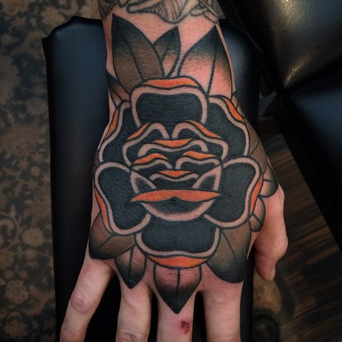 Rose hand tattoo
