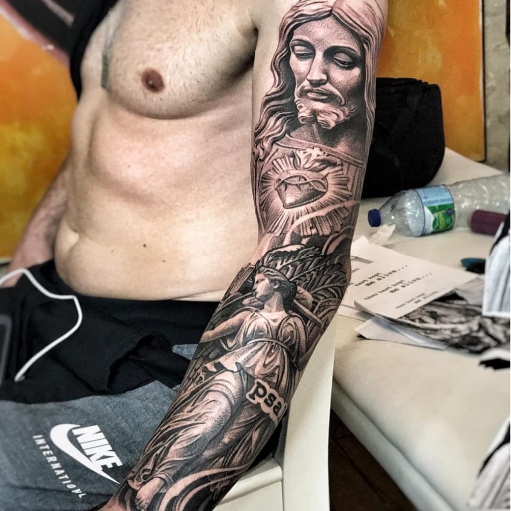 Sacred Heart Realism man tattoo