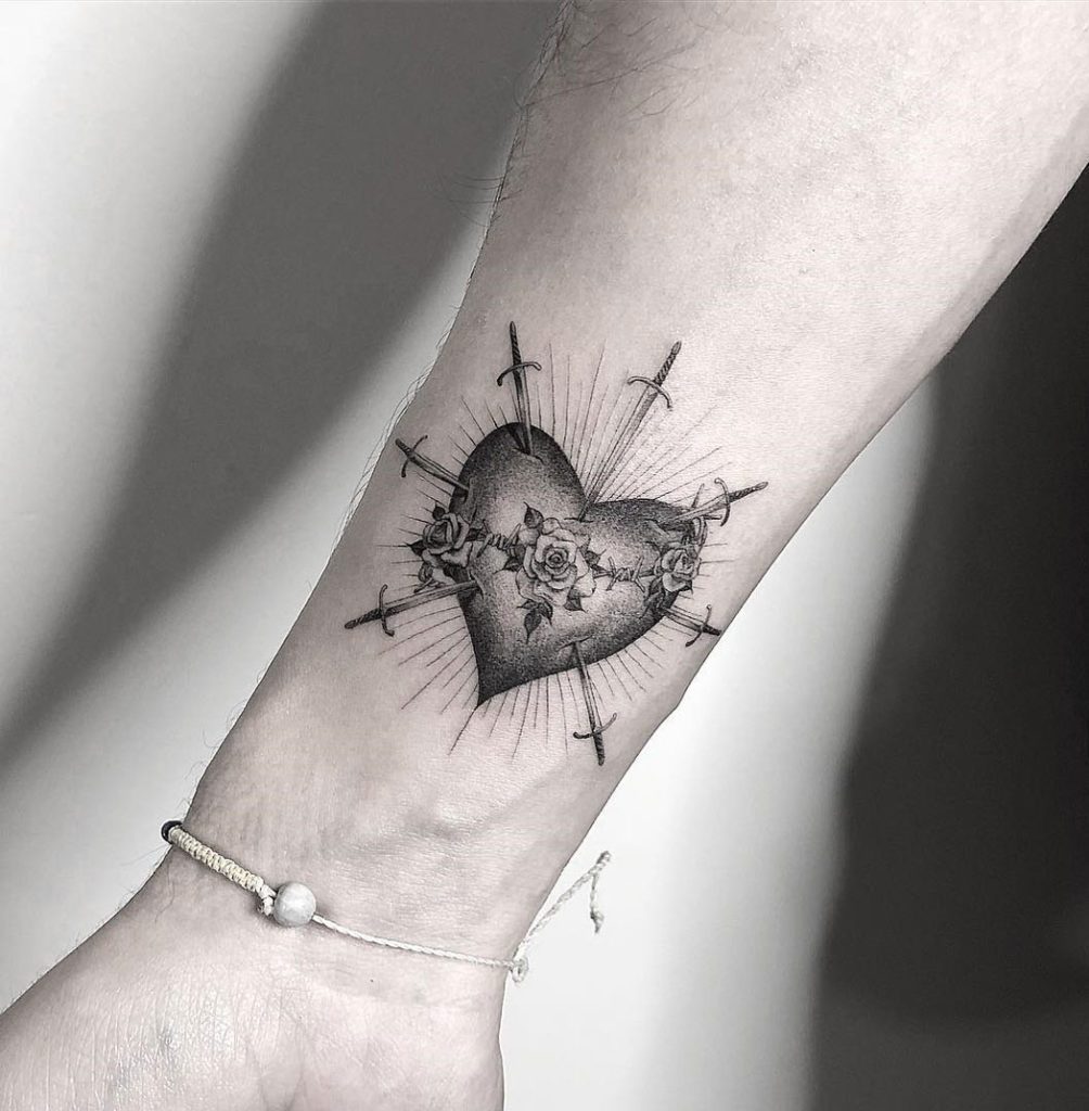 Sacred Heart angel tattoo