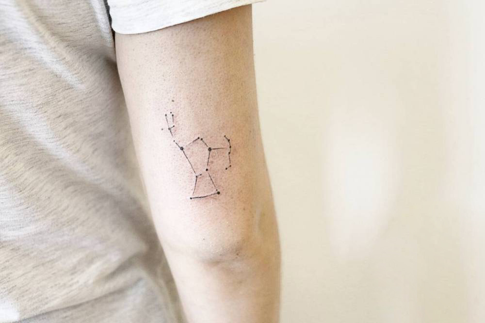 Small Orion Constellation Tattoo On The Back Of The Right Upper Arm