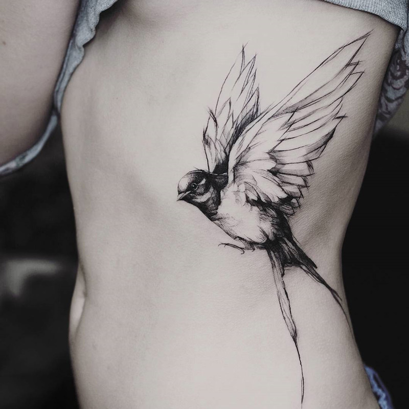 Swallow side birl girl tattoo black ink