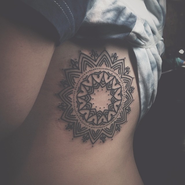 Tattoo On The Rib Cage