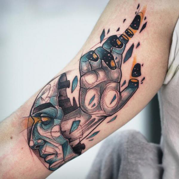 Tattoo arm head hand abstract