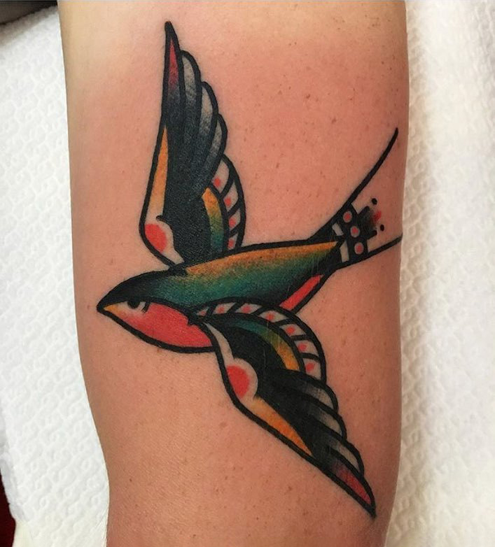 Traditional bird girl tattoo