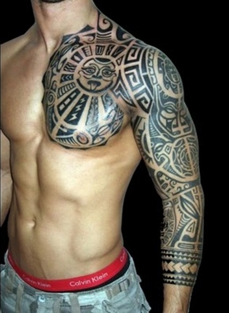 Tribal tattoo design that covers the whole arm and one side of the chest Tribal tattoo design that covers the whole arm and one side of the chest