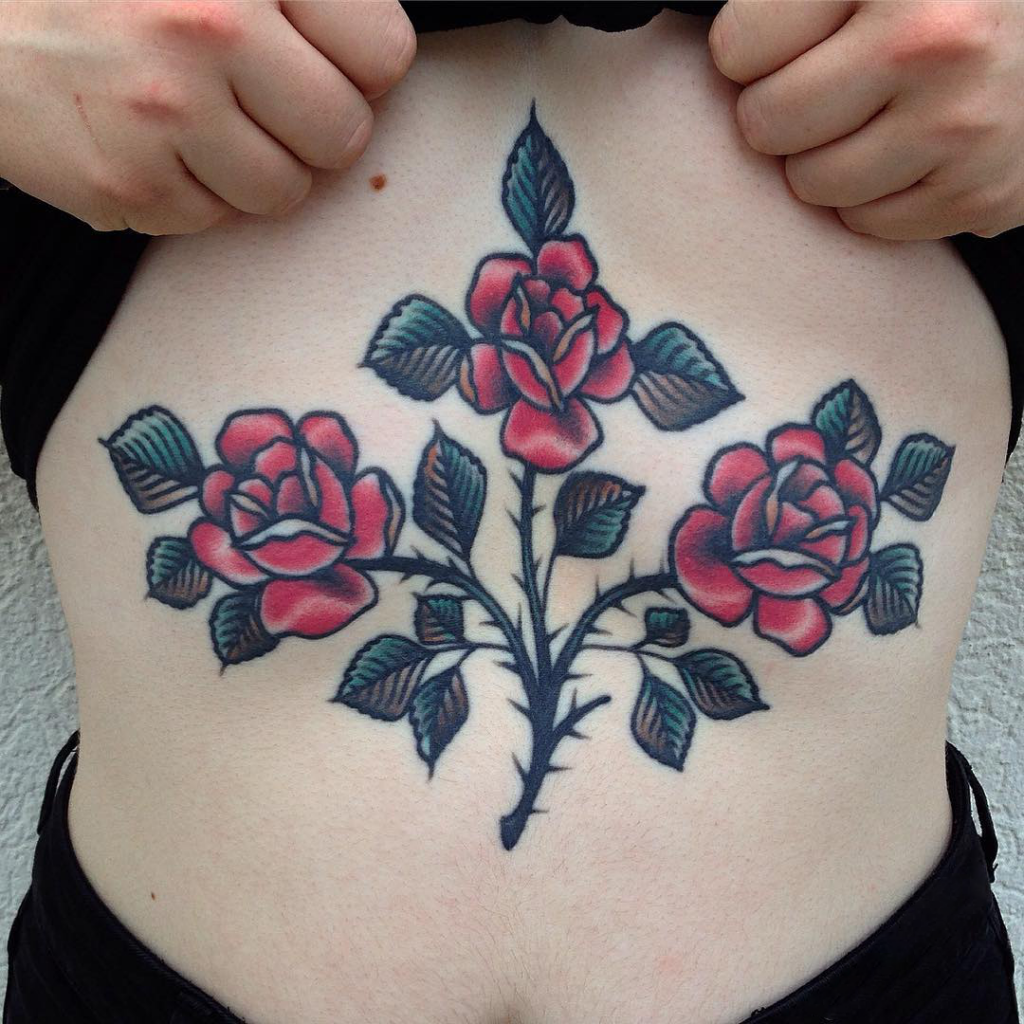 Triple rose sternum tattoo