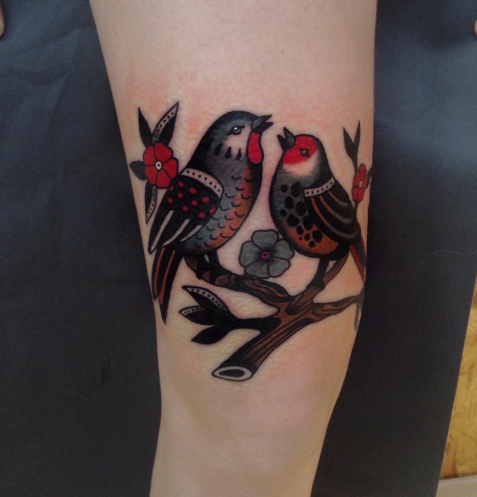 Two birds on a branch