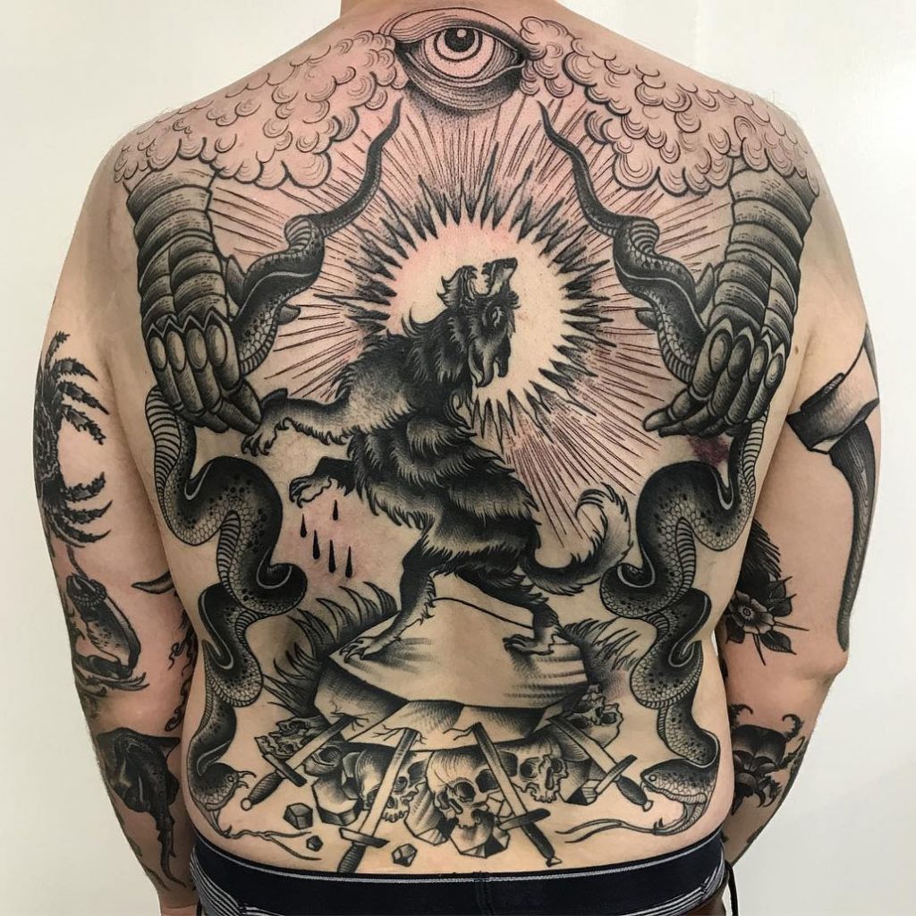 Wolf snakes abstract back tattoo