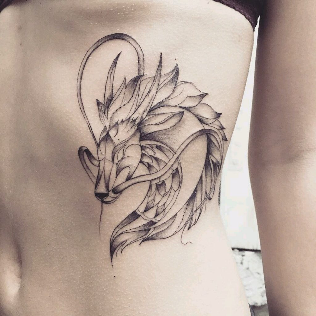 Women waistline dragon tattoo