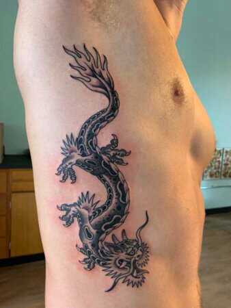 american traditional dragon tattoo