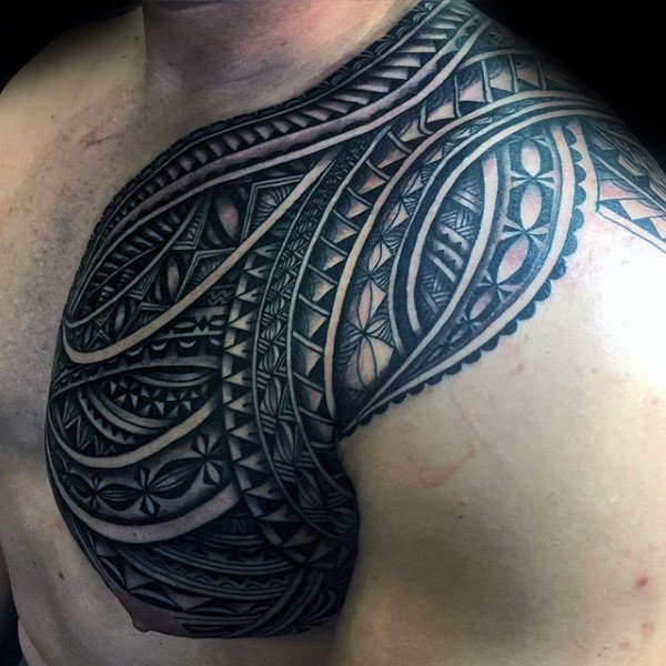chest and shoulder samoan tribal tattoo on man