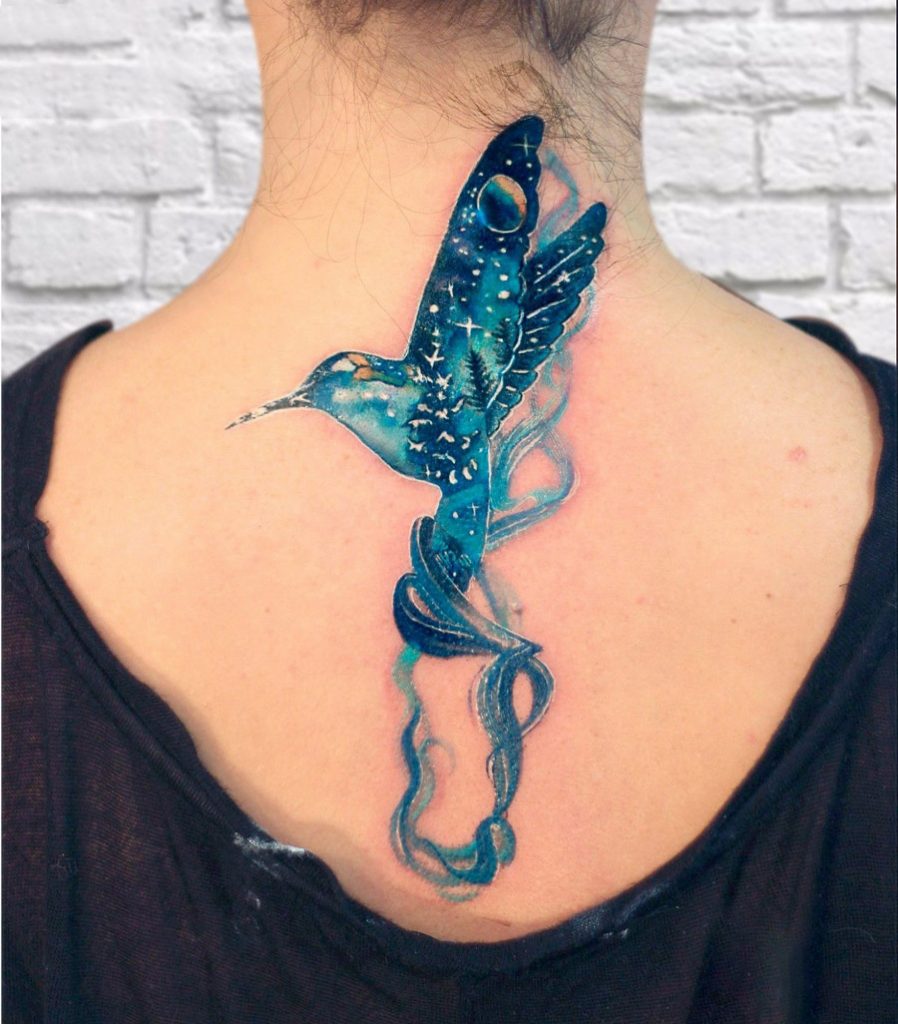 hummingbird space back tattoo