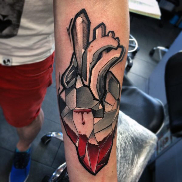 Abstract graffiti heart tattoo for guys on forearm