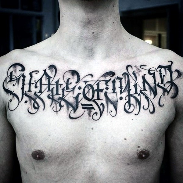 Abstract lettering mens script upper chest tattoo
