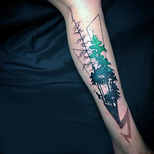 Abstract watercolor tree lightning bolt forearm tattoo on gentleman