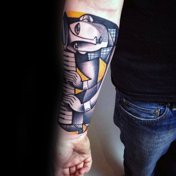 Artistic male abstract piano player tattoo on inner forearm