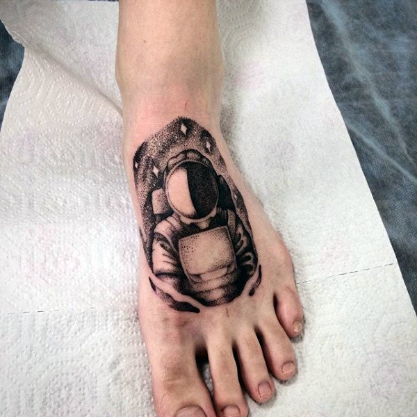 Astronaut dotwork tattoos male feet