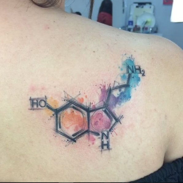 Back molecular watercolor tattoo