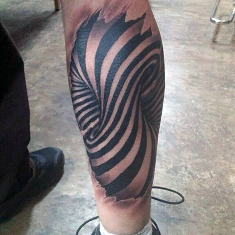 Back of leg calf spiral optical illusion male tattoo Back of leg calf spiral optical illusion male tattoo