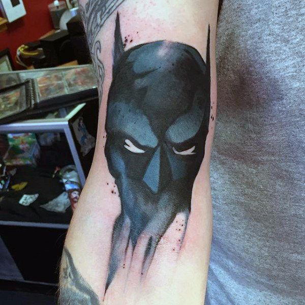 Batman mask watercolor tattoo for men on forearms Batman mask watercolor tattoo for men on forearms