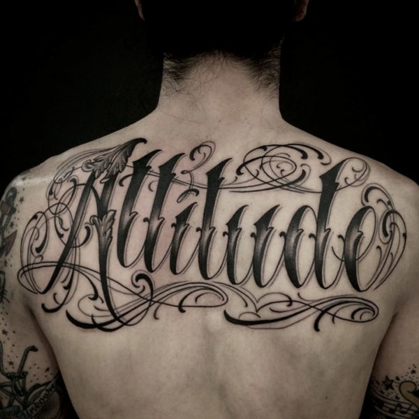 Beautiful cursive letters tattoo