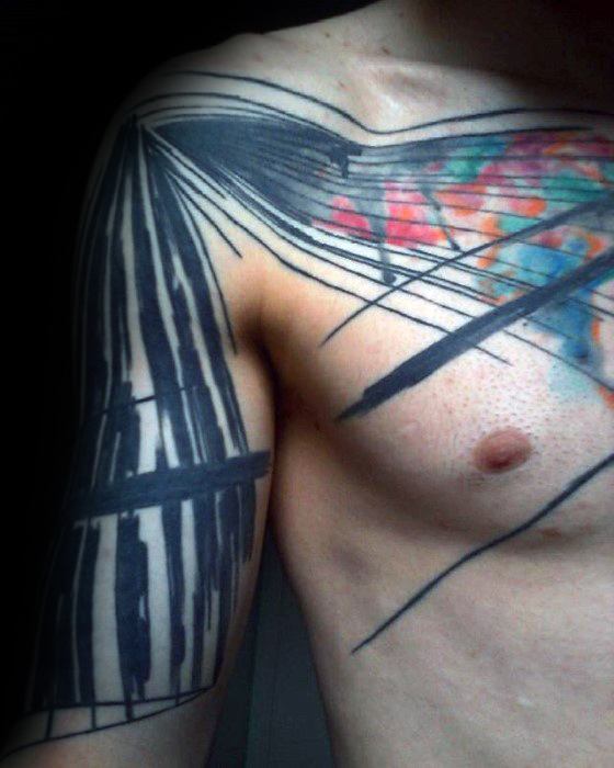Black lines with colorful design guys artsy chest and arm tattoo Black lines with colorful design guys artsy chest and arm tattoo