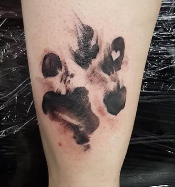 Blackwork Dog Paw Tattoo