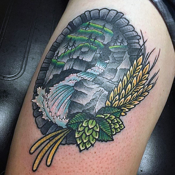 Bordered waterfall neo traditional scene upper arm tattoo on man Bordered waterfall neo traditional scene upper arm tattoo on man