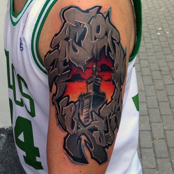 Building with wildstyle graffiti tattoo for men on upper arm Building with wildstyle graffiti tattoo for men on upper arm
