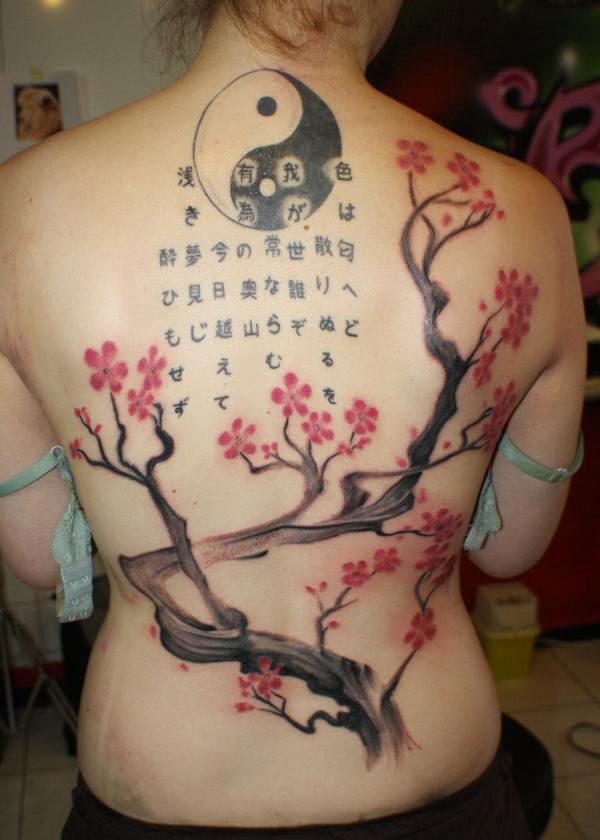 Cherry tree girl back tattoo