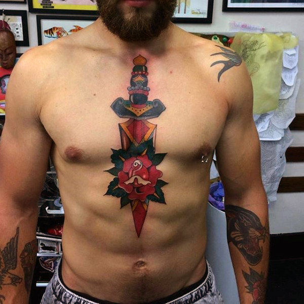 Chest dagger into rose tattoo