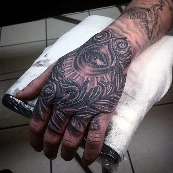 Cool all seeing eye mens filigree hand tattoo