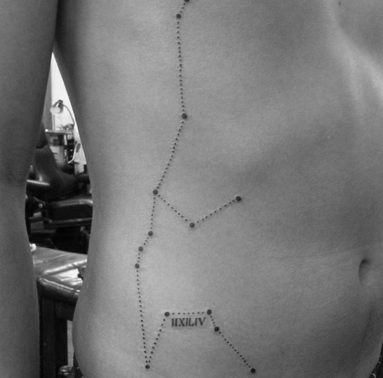 Cool aquarius constellation mens rib cage side tattoo