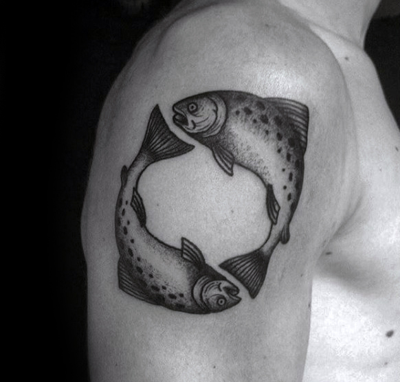 Cool dotwork detailed pisces fish tattoos for guys on upper arm