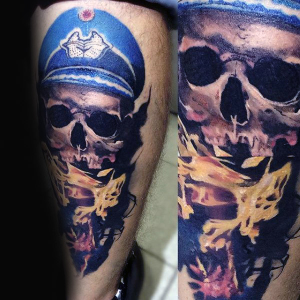 Cool fire men skull back of leg tattoo Cool fire men skull back of leg tattoo