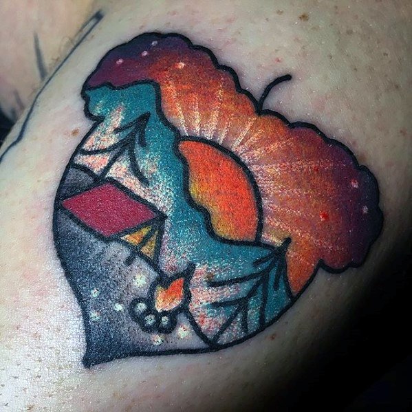 Cool small nature acorn camping tattoo on arm