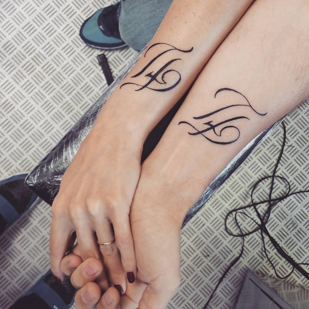Couple monogram girl and boy tattoo