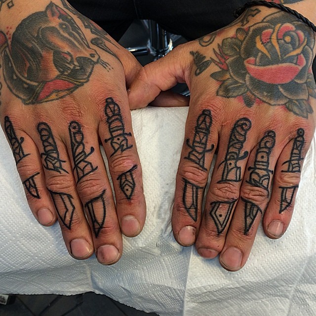 Dagger Collection On The Fingers