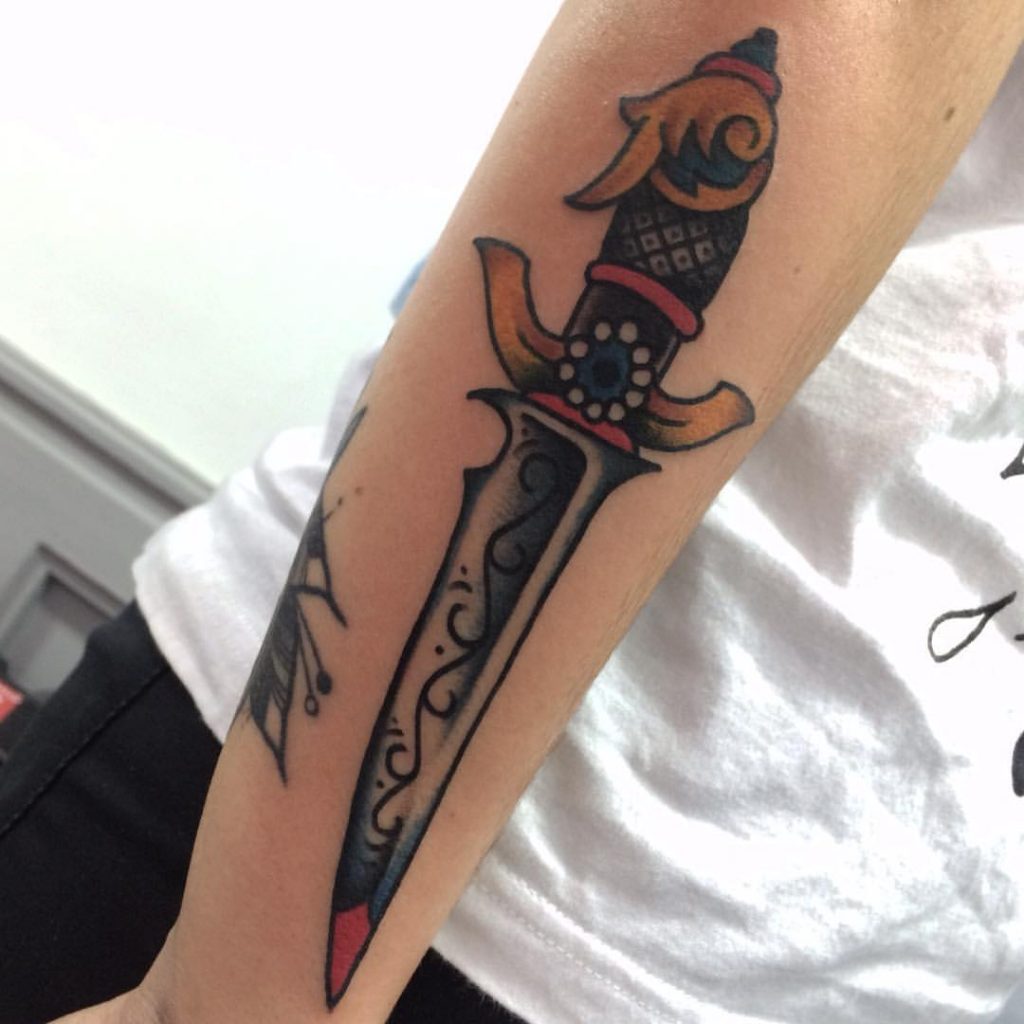 Dagger Tattoo On The Forearm